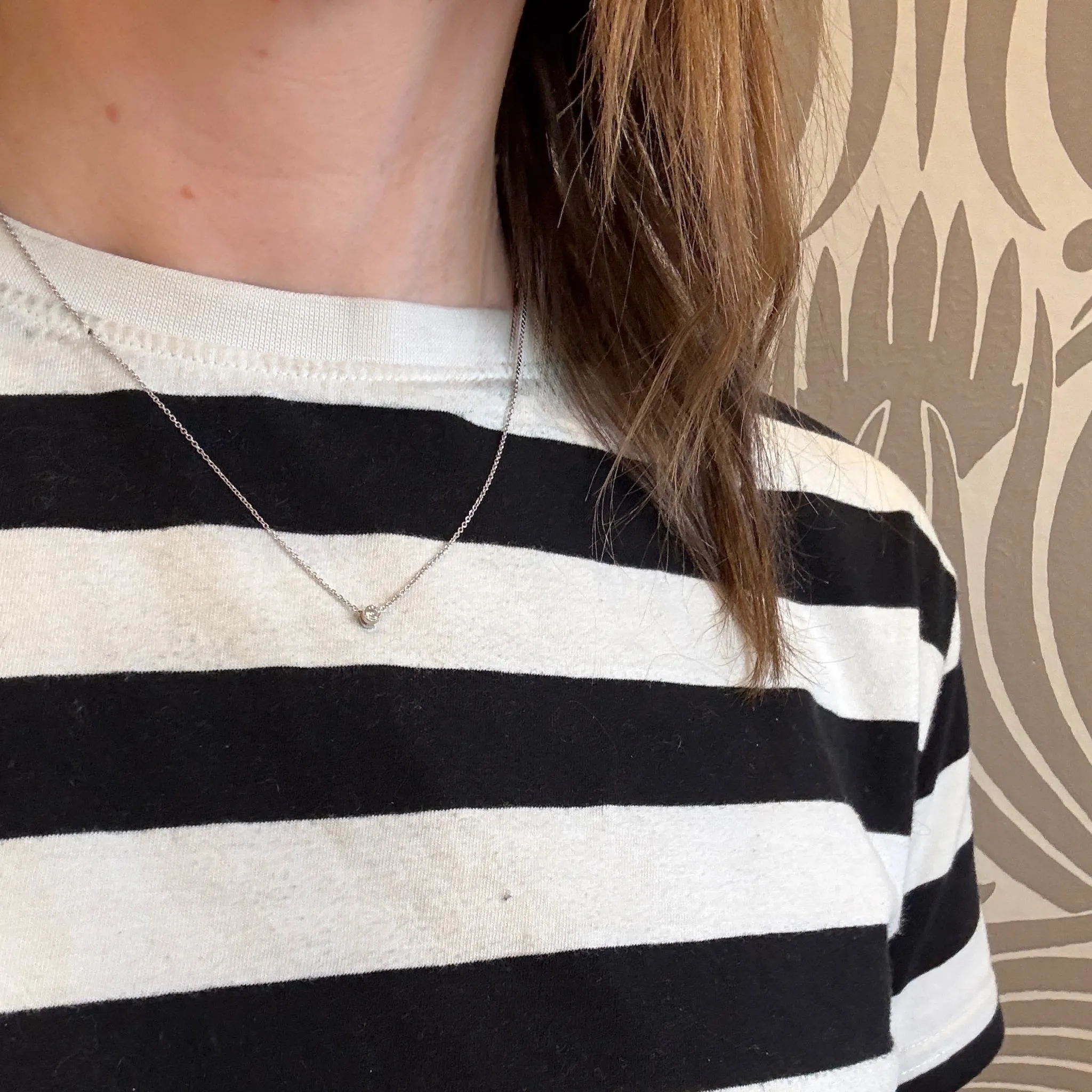 Cheeky Little .10ct Diamond in Platinum Bezel Pendant