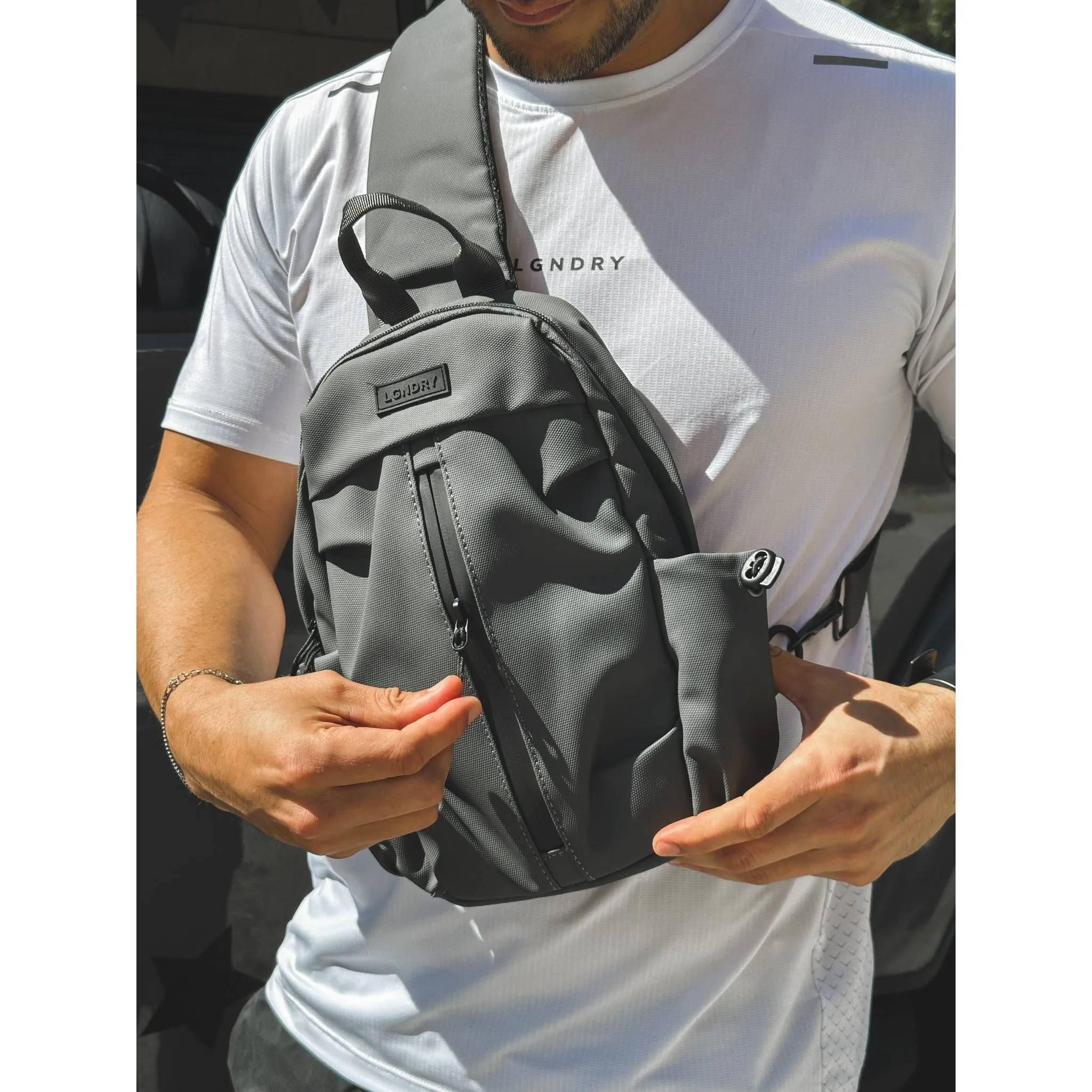 SLING CROSSBODY BAG