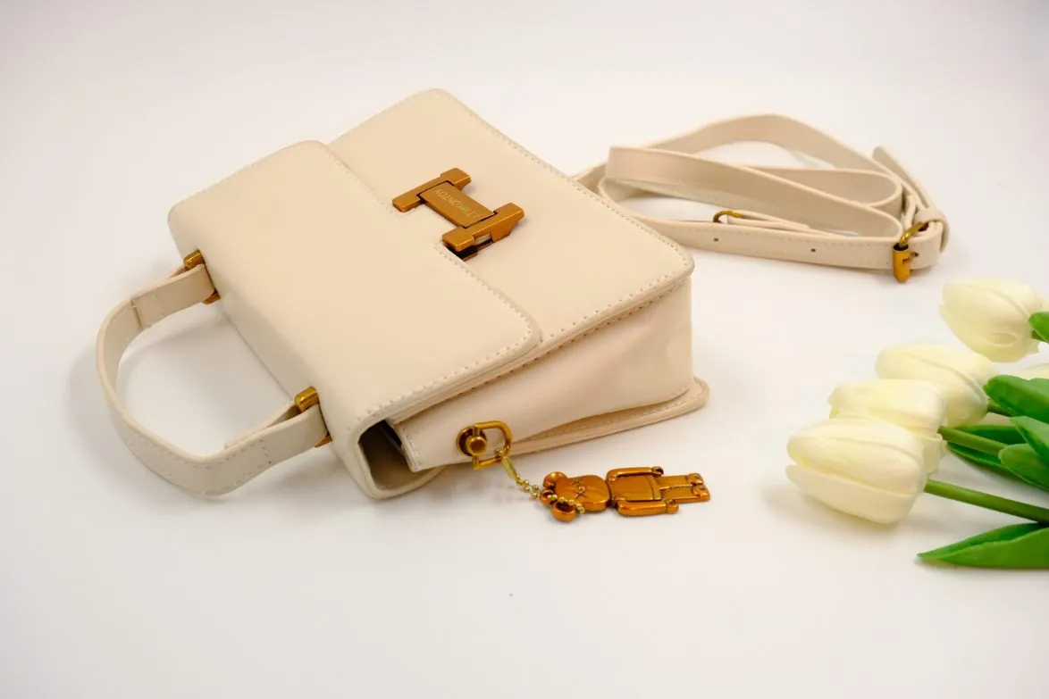 Sophisticated Ivory Handbag with Gold Accents