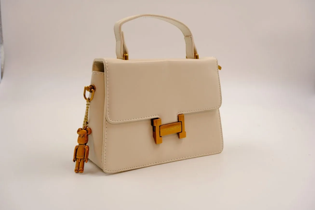Sophisticated Ivory Handbag with Gold Accents